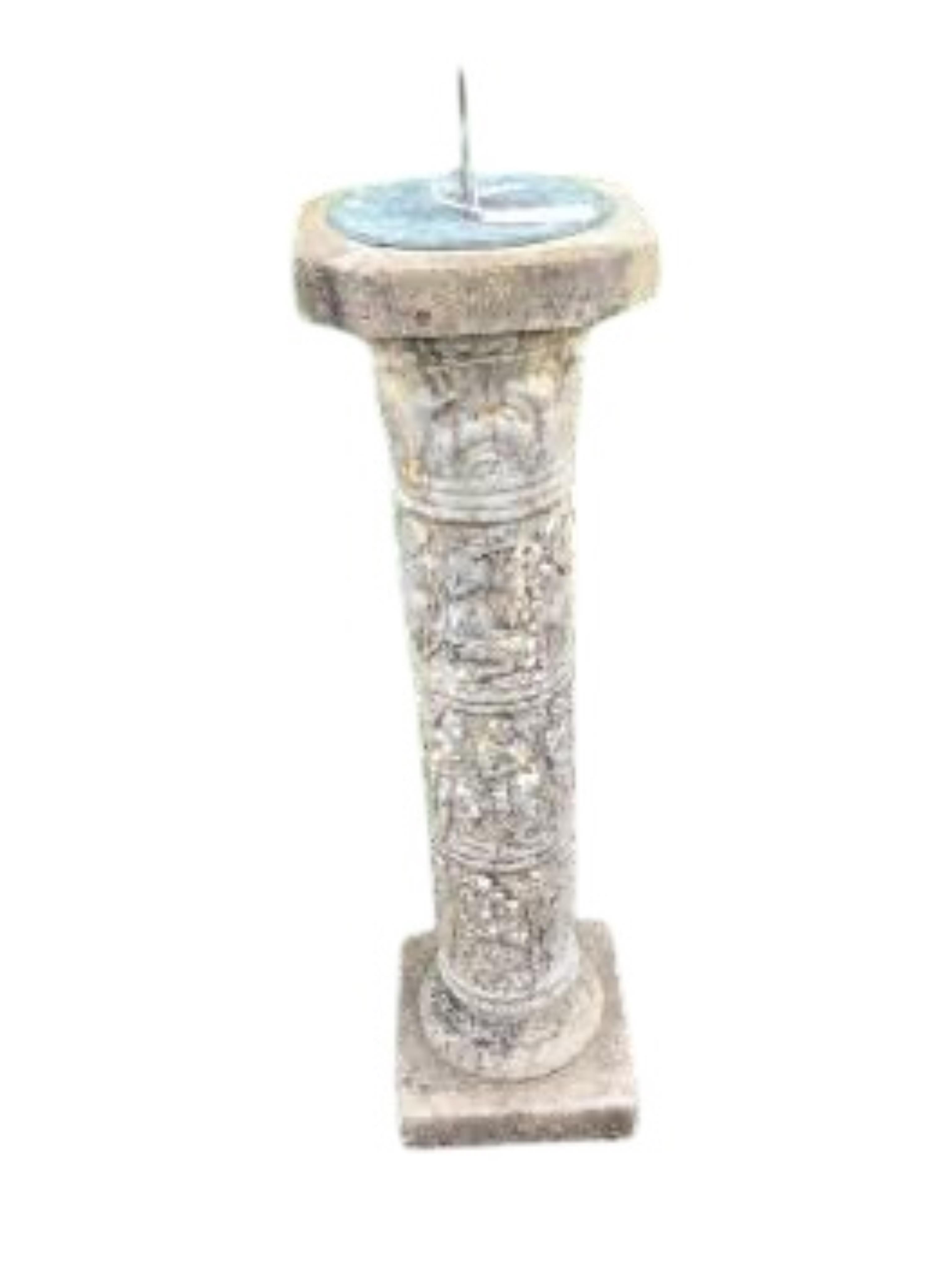 A reconstituted stone and cast metal sundial, height 92cm
